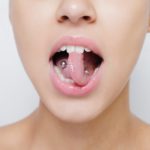 Los piercings orales, ¿afectan a la salud de nuestra boca?